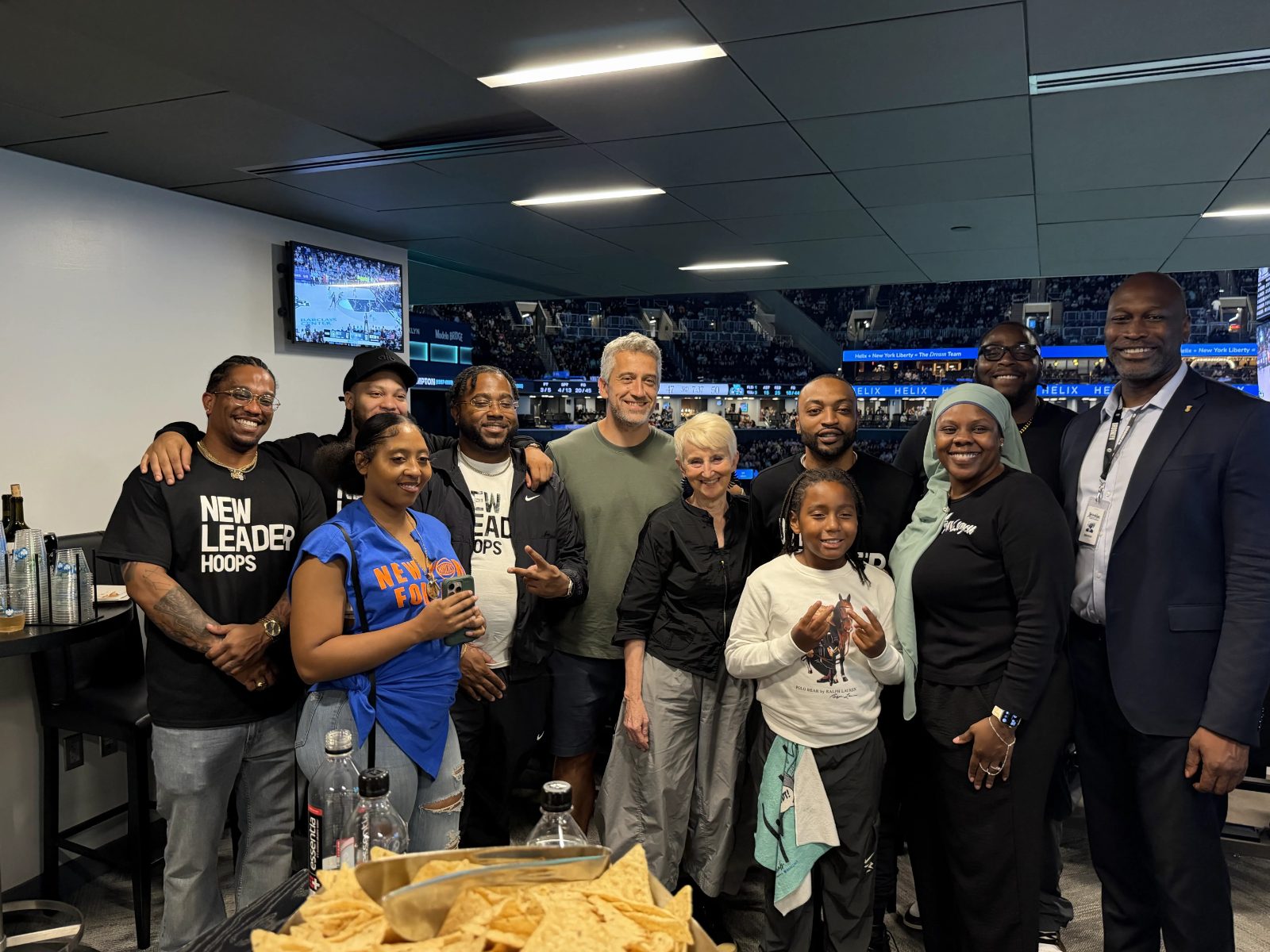Participants and supporters gathered at a basketball arena