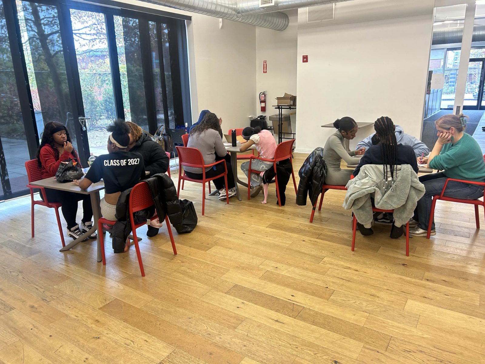 Participants working together at tables during a workshop